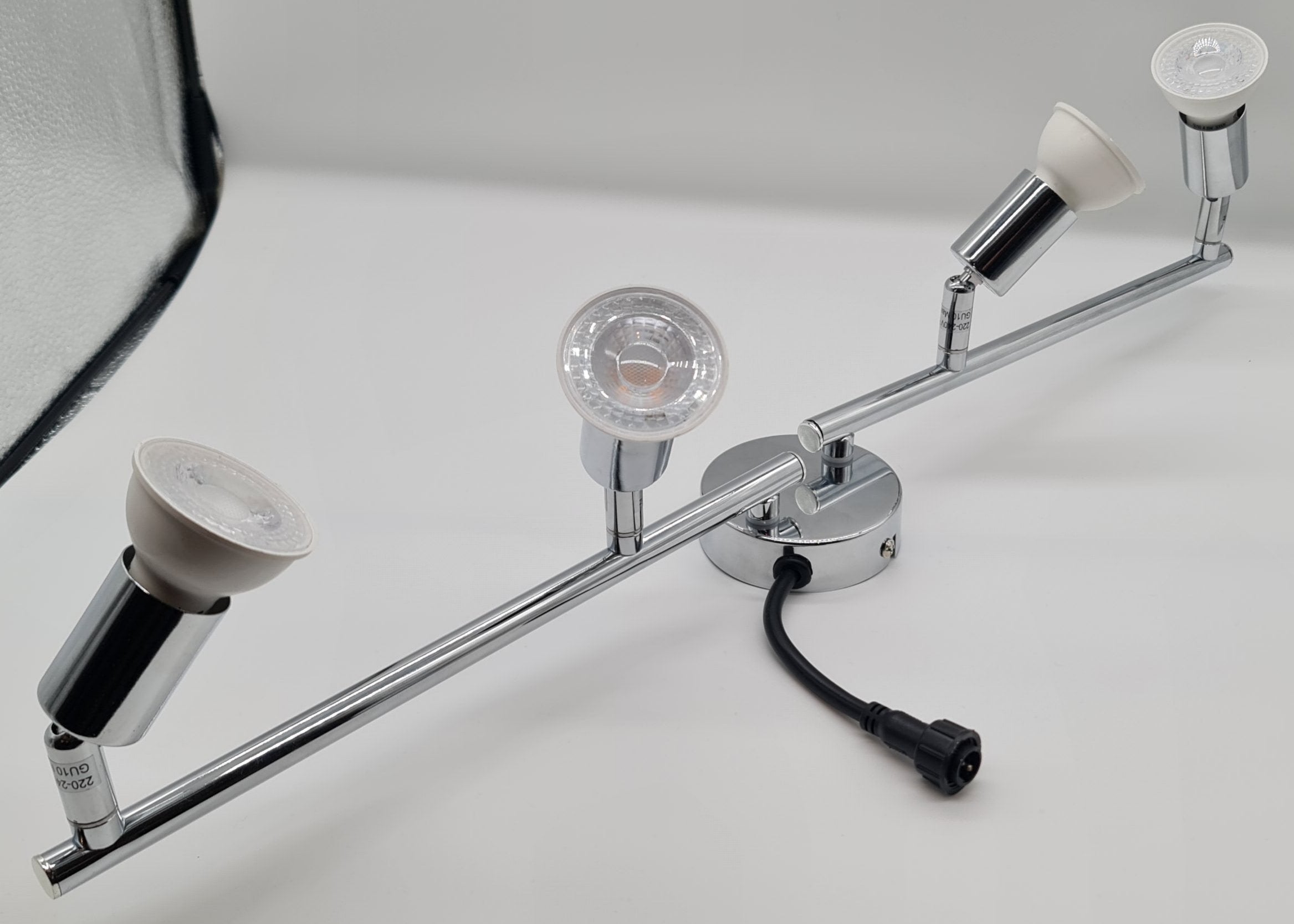 Four way chrome spot light